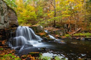 A long exposure photograph of Middle Falls, a waterfall on Black Creek in the town of Esopus, on an October morning.