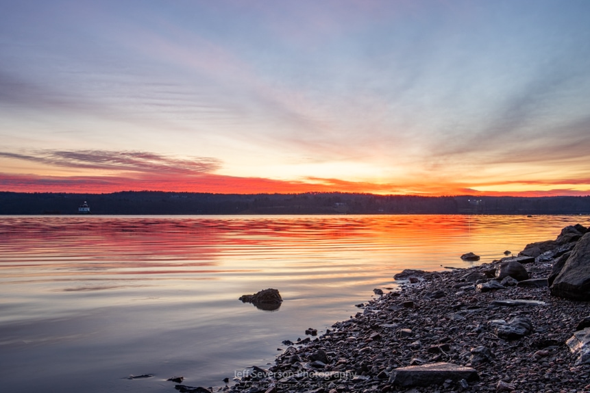 A photo of a sunrise over the Hudson River on a December morning.