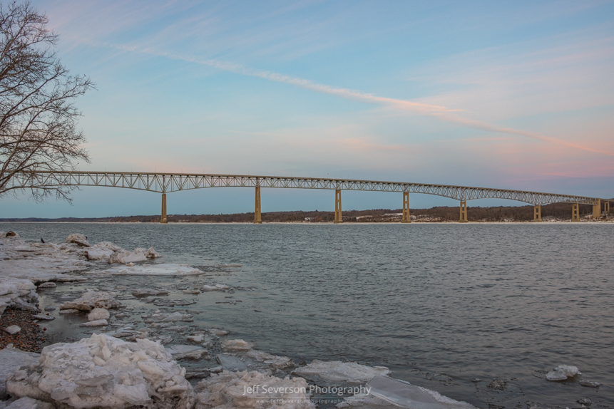 A picture of twilight over the Kingston-Rhinecliff Bridge and the Hudson River on a February evening.