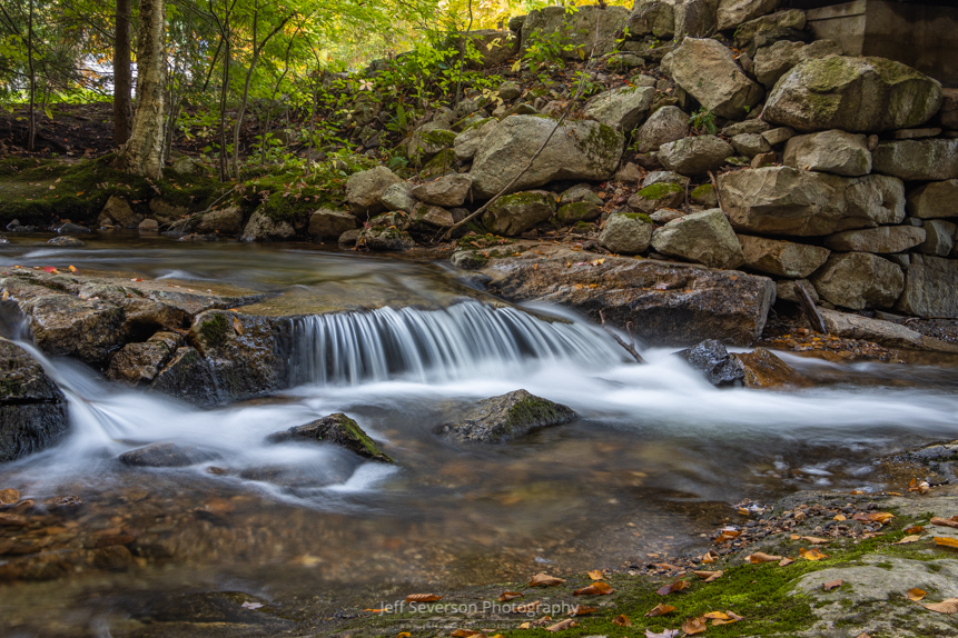 A photo of a mini waterfall on the Coxing Kill on an October morning at the Mohonk Preserve in Gardiner, NY.