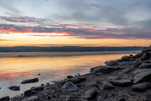 Sunrise on an October morning over the Hudson River from the shore of Lighthouse Park in Esopus, NY.