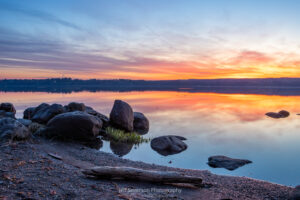 A photo of a mid-April sunrise over the Hudson River from the shore of Lighthouse Park in Ulster Park.
