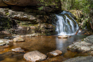 A long exposure photo of the first of four cascade waterfalls at a location in TN known as The Blue Hole.