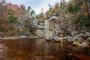 A long exposure photograph of Awosting Falls at Minnewaska State Park Preserve in Kerhonkson, NY during peak foliage on an October morning.
