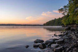 A dawn photo along the shores of the Hudson River as fog lifts from the river on a September morning at Lighthouse Park in Ulster Park, NY.